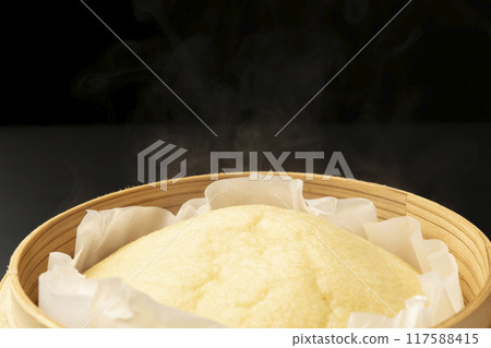 Making steamed bread Steamed bread in a bamboo steamer 117588415