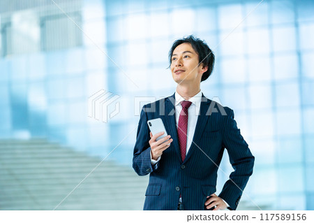 Male businessman in a suit Male businessman in a suit 117589156
