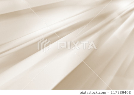 Shiny, silky light beige drape background. Elegant, luxurious texture. Shiny, silky light beige drape background. Elegant, luxurious texture. 117589408