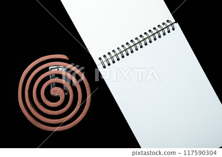 A mosquito coils object is on a black background 117590304