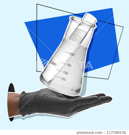 A person is holding a beaker with a liquid in it 117590536