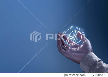 A hand holding a virtual clock A hand holding a virtual clock 117590548