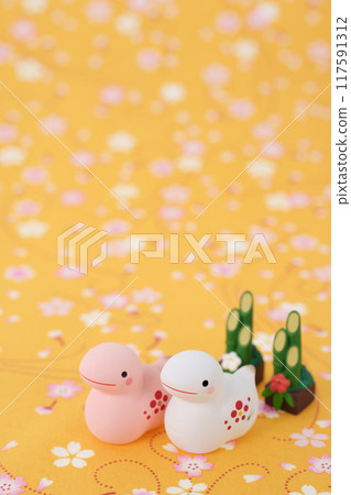 Year of the Snake New Year's material Red and white snake and Kadomatsu Sakura floral background Year of the Snake New Year's material Red and white snake and Kadomatsu Sakura floral background 117591312