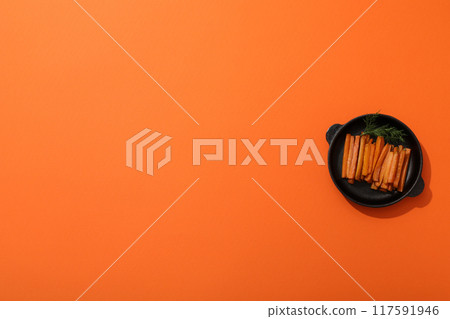 Fried carrot, concept of tasty fried food Fried carrot, concept of tasty fried food 117591946