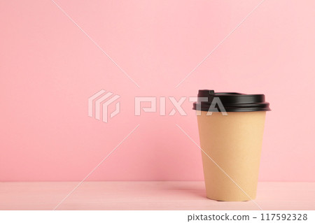 Paper cup of coffee on pink background Paper cup of coffee on pink background 117592328