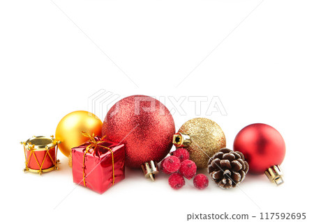 Christmas red and gold decorations isolated on white background. Christmas red and gold decorations isolated on white background. 117592695