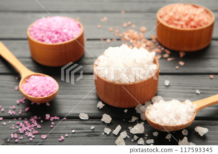 Different types of salt on black background. 117593345