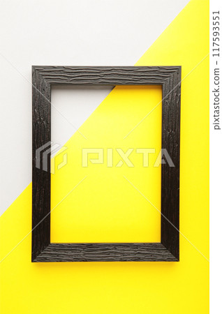 Black frame on yellow and gray background. Creative Flat lay Top view Mockup Copy space for text. Black frame on yellow and gray background. Creative Flat lay Top view Mockup Copy space for text. 117593551
