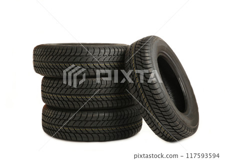 Four new black tires isolated on white background 117593594