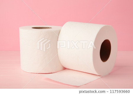 Toilet paper close-up on pink background with copy space 117593660