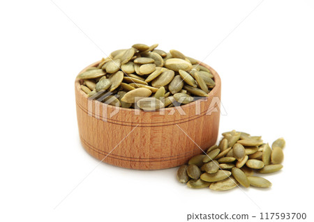 Pumpkin seed in bamboo bowl isolated on white 117593700