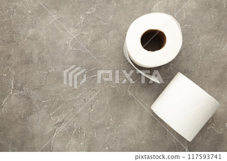 Toilet paper close-up on grey background with copy space 117593741