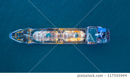 Aerial view Oil and Gas tanker ship LPG tanker ship transportation oil and gas from refinery on the sea at night, Oil and Gas tanker ship global business logistic refinerytransportation. 117593944