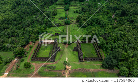 Aerial view Vat Phou or Wat Phu in Champasak, Southern Laos, Vat Phou or Wat Phu hindu temple in the Khmer Empire located in the capital of Champasak, Laos Aerial view Vat Phou or Wat Phu in Champasak, Southern Laos, Vat Phou or Wat Phu hindu temple in the Khmer Empire located in the capital of Champasak, Laos 117594006