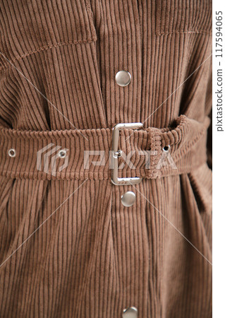 Detail dress. Brown dress belt close up. Top view Detail dress. Brown dress belt close up. Top view 117594065