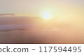 Colorful sunrise over Antarctica ocean coast. Aerial drone flight above telecom engineer maintenance cell signal antenna from polar base station. Morning orange bright fog background. Nature wallpaper 117594495