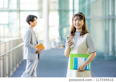 Female college student with smartphone 117594618