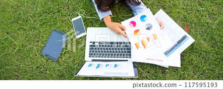 Banner Asian entrepreneur business woman reading business graph analyze chart using laptop on green garden at home. Panorama women Freelance working home office at cafe green park with copy space Banner Asian entrepreneur business woman reading business graph analyze chart using laptop on green garden at home. Panorama women Freelance working home office at cafe green park with copy space 117595193