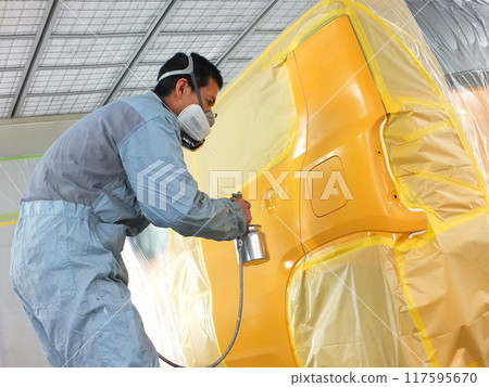 Painting work at an automobile body repair and painting factory 27 117595670