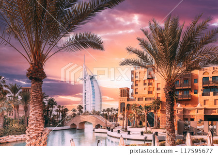 Dubai, United Arabian Emirates. View of Madinat Jumeirah Arabian Resort. Beautiful view of hotel Burj Al Arab from Madinat Jumeirah in sunny summer day. Luxury resort in Dubai 117595677