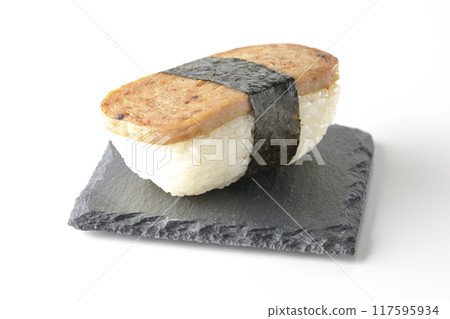 Spam musubi served on a slate plate photographed on a white background 117595934