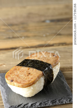 Spam musubi served on a slate plate Spam musubi served on a slate plate 117596166
