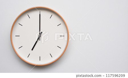 Minimalist wooden Wall Clock on White Wooden Surface with Space for Text. Time Set at 19.00/07.00 Minimalist wooden Wall Clock on White Wooden Surface with Space for Text. Time Set at 19.00/07.00 117596209
