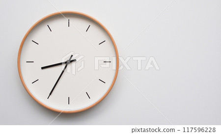 Minimalist wooden Wall Clock on White Wooden Surface with Space for Text. Time Set at 20.35/08.35 Minimalist wooden Wall Clock on White Wooden Surface with Space for Text. Time Set at 20.35/08.35 117596228