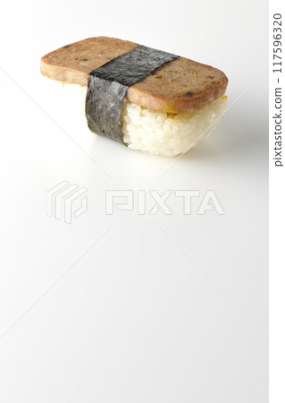 Spam musubi photographed on white background Spam musubi photographed on white background 117596320