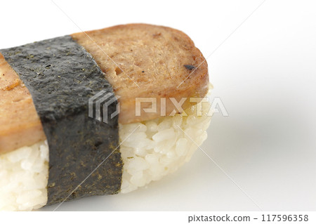Spam musubi photographed on white background Spam musubi photographed on white background 117596358