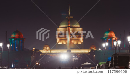 New Delhi, Delhi, India. Close up of Rashtrapati Bhavan, Viceroys House, official residence Presidential Palace in Kartavya Path, Rajpath Area. Rashtrapati Bhavan in evening night illumination lights New Delhi, Delhi, India. Close up of Rashtrapati Bhavan, Viceroys House, official residence Presidential Palace in Kartavya Path, Rajpath Area. Rashtrapati Bhavan in evening night illumination lights 117596606