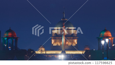 New Delhi, Delhi, India. Close up of Rashtrapati Bhavan, Viceroys House, official residence Presidential Palace in Kartavya Path, Rajpath Area. Rashtrapati Bhavan in evening night illumination lights New Delhi, Delhi, India. Close up of Rashtrapati Bhavan, Viceroys House, official residence Presidential Palace in Kartavya Path, Rajpath Area. Rashtrapati Bhavan in evening night illumination lights 117596625