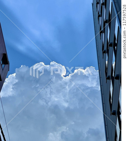 White glowing clouds in summer White glowing clouds in summer 117597528