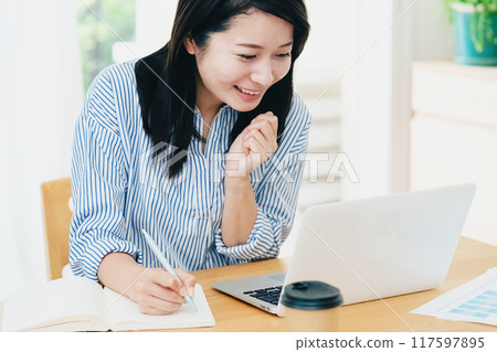 Women having an online meeting Women having an online meeting 117597895
