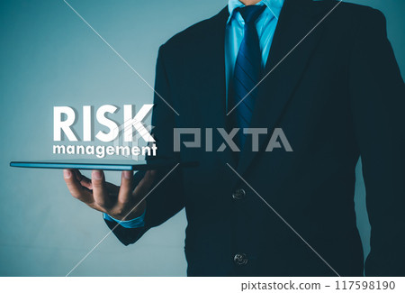 Person use tablet with virtual icon of Risk analysis in business decisions, Risk management concept, Risk control and management strategies for risky businesses. Person use tablet with virtual icon of Risk analysis in business decisions, Risk management concept, Risk control and management strategies for risky businesses. 117598190