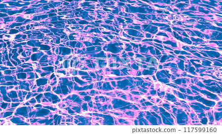 The surface of a swimming pool at night, illuminated by soft pink and blue neon lights. The surface of a swimming pool at night, illuminated by soft pink and blue neon lights. 117599160