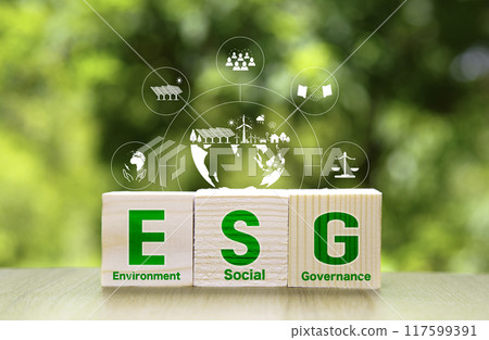 ESG icon in wood on green background. Renewable sustainable green energy icon in wood. Green energy Renewable that is important to the world.Environmental protection, renewable, sustainable. 117599391