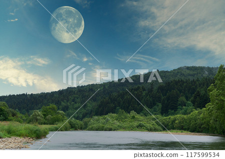 Full moon in the twilight or night cloudy blue sky. Mountains and river panoramic landscape. Full moon in the twilight or night cloudy blue sky. Mountains and river panoramic landscape. 117599534