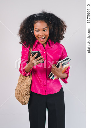 Excited African American Woman Reading Phone Message. 117599640