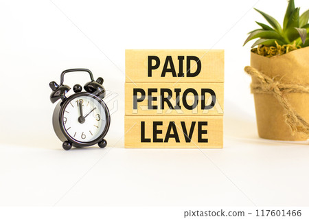Paid period leave symbol. Concept words Paid period leave on wooden blocks. Black alarm clock. Beautiful white table white background. Business medical paid period leave concept. Copy space. Paid period leave symbol. Concept words Paid period leave on wooden blocks. Black alarm clock. Beautiful white table white background. Business medical paid period leave concept. Copy space. 117601466