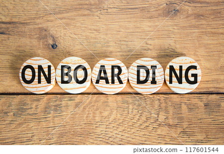 Onboarding success symbol. Concept word Onboarding on wooden circles. Beautiful wooden background. Business onboarding success concept. Copy space. 117601544