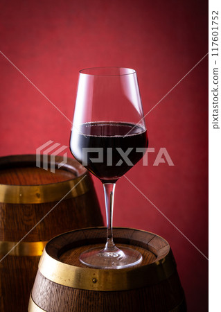 Red wine and aging barrels Red wine and aging barrels 117601752