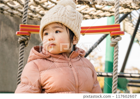 Baby playing in the park Baby playing in the park 117602607
