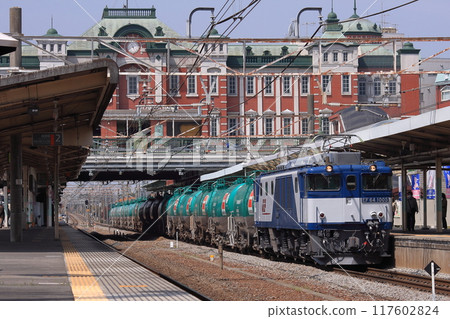 A freight train pulled by EF64-1005 passing through the brick-built Takasaki Line Fukaya Station. Photographed on April 10, 2010 A freight train pulled by EF64-1005 passing through the brick-built Takasaki Line Fukaya Station. Photographed on April 10, 2010 117602824