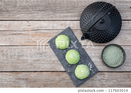 Traditional japanese desert mochi with matcha latte tea Traditional japanese desert mochi with matcha latte tea 117603014