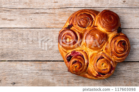 Homemade cake pie roll with cherry . Food background 117603098