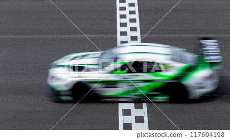 Motion blur race car racing on speed track, Car race on the international circuit race track crossing start and finish line, Race car on road crossing start and finish line, Target business achieve 117604198