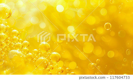 Yellow color oil bubbles background. 117604733