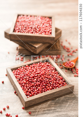 Red beans in a wooden box on a wooden board Red beans in a wooden box on a wooden board 117604830