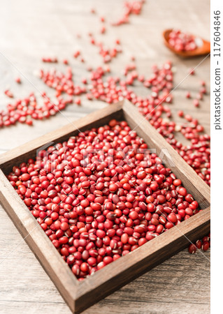 Red beans in a wooden box on a wooden board Red beans in a wooden box on a wooden board 117604846